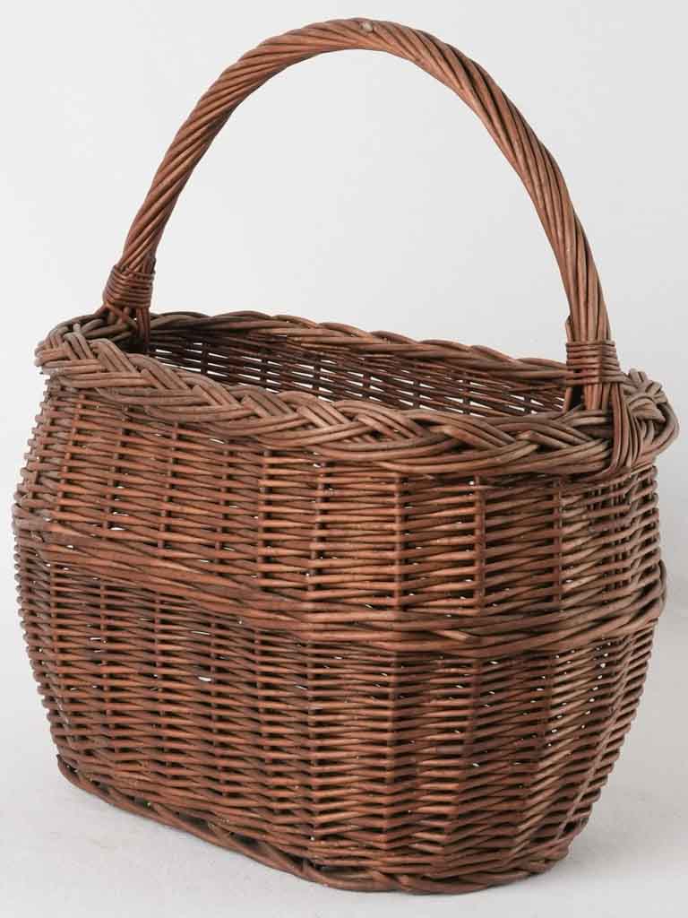 Vintage wicker cherry-picking basket
