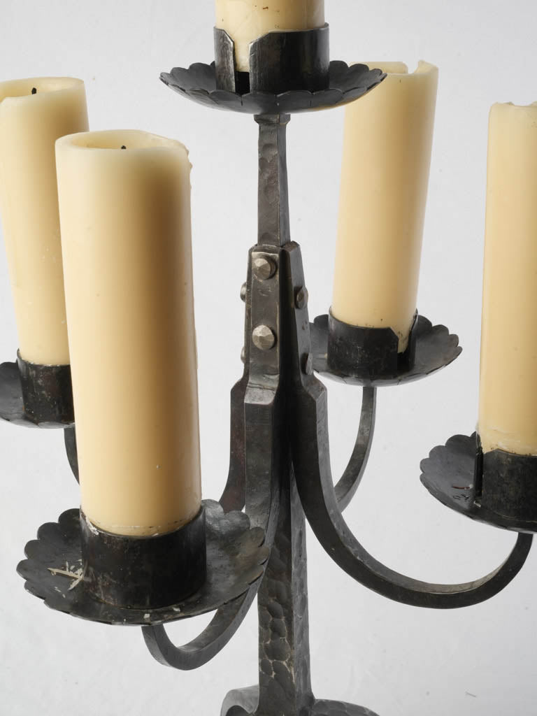 Burnished dark iron candle holder