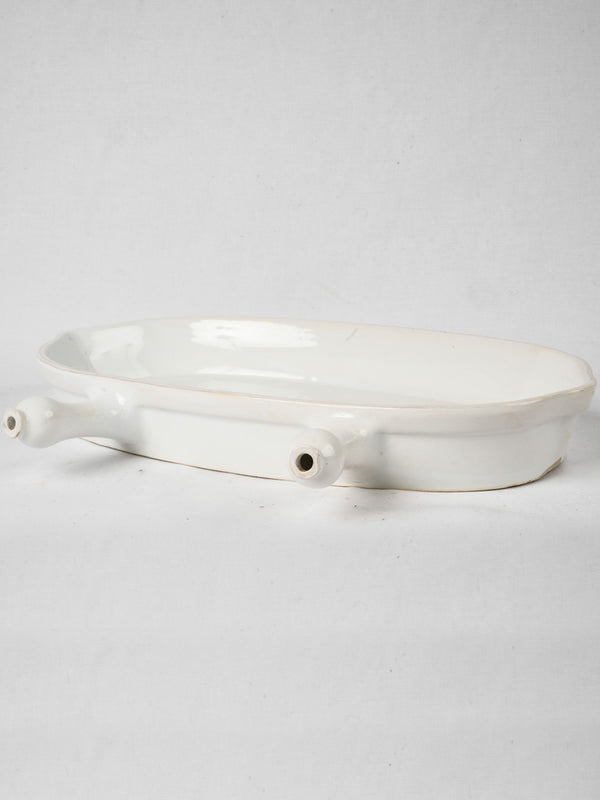 Antique white-glazed French basting pan