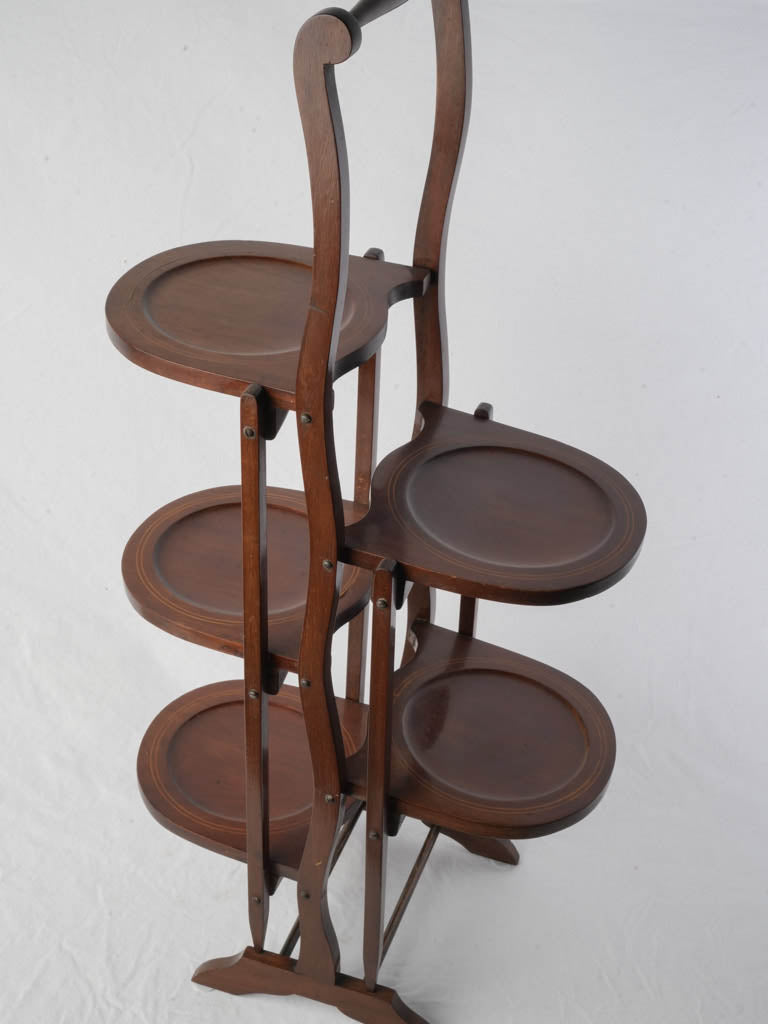 Graceful early-20th-century plate holder  