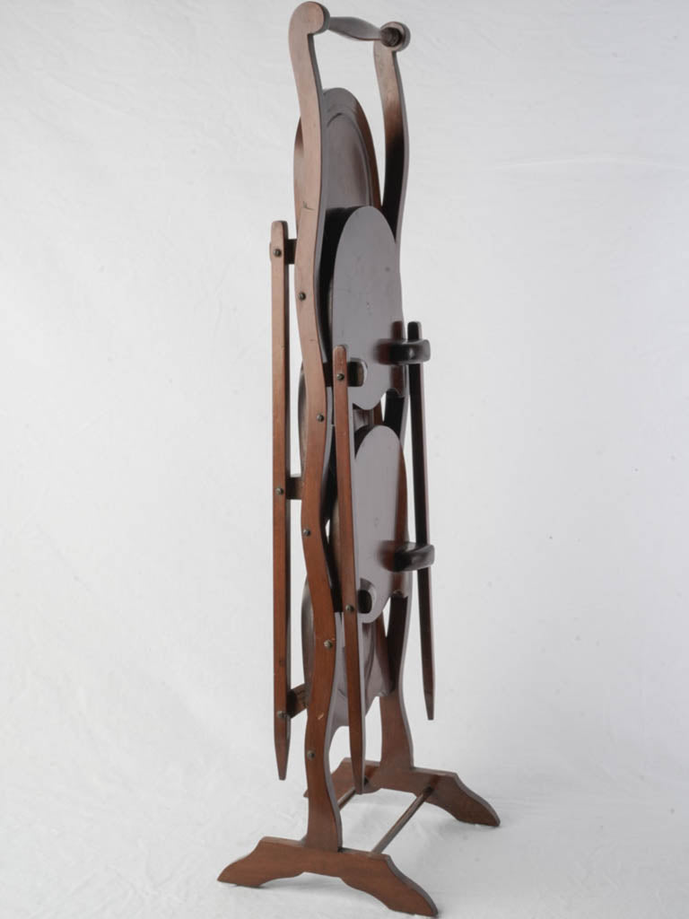 Sculptural warm-toned mahogany stand  