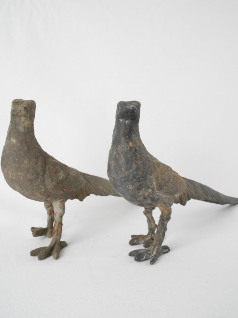 Detailed antique iron bird figurines