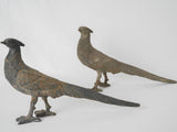 Antique iron yard pheasant statues