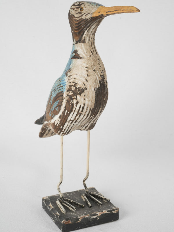 Wooden artisan-made sculpture of a bird 13"
