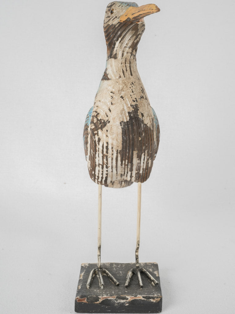 Whimsical hand-carved wooden bird decor