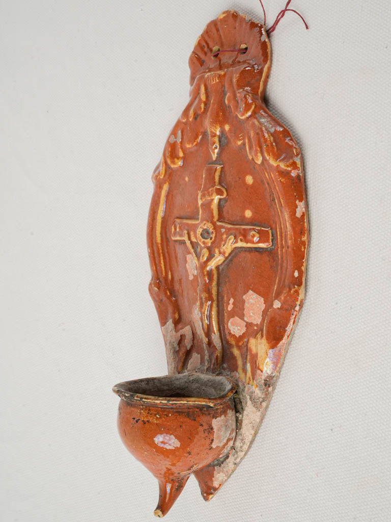 Timeworn glazed terracotta artifact