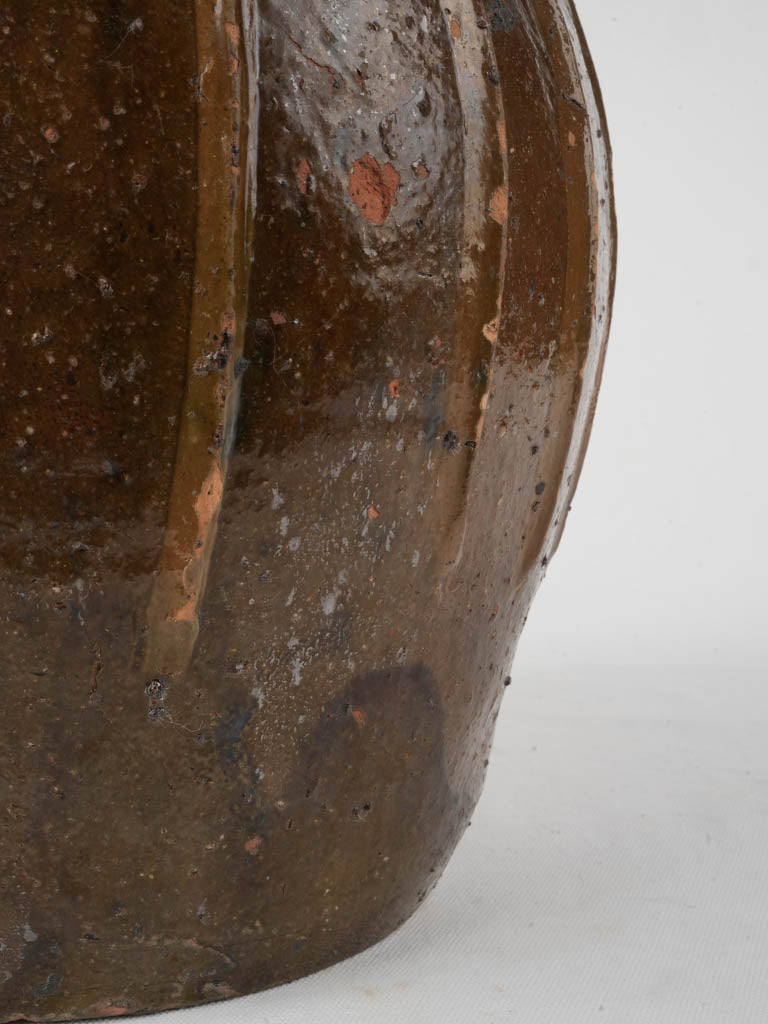 Prized French walnut oil pottery  