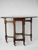 Expandable half-moon-shaped English oak table