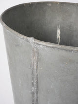 Dent-detailed zinc florist vase