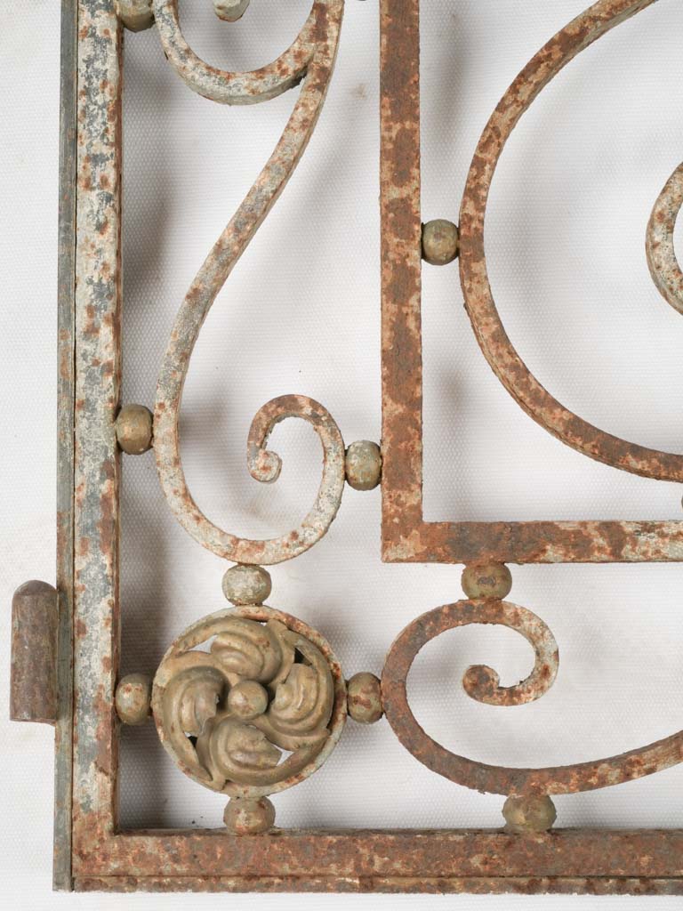 Romantic rosette-adorned French gate fragment