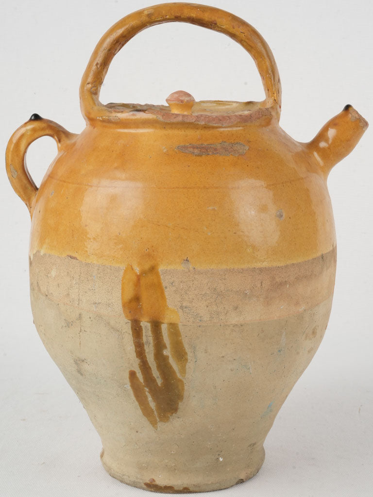 Earthy ocher village spouted pitcher