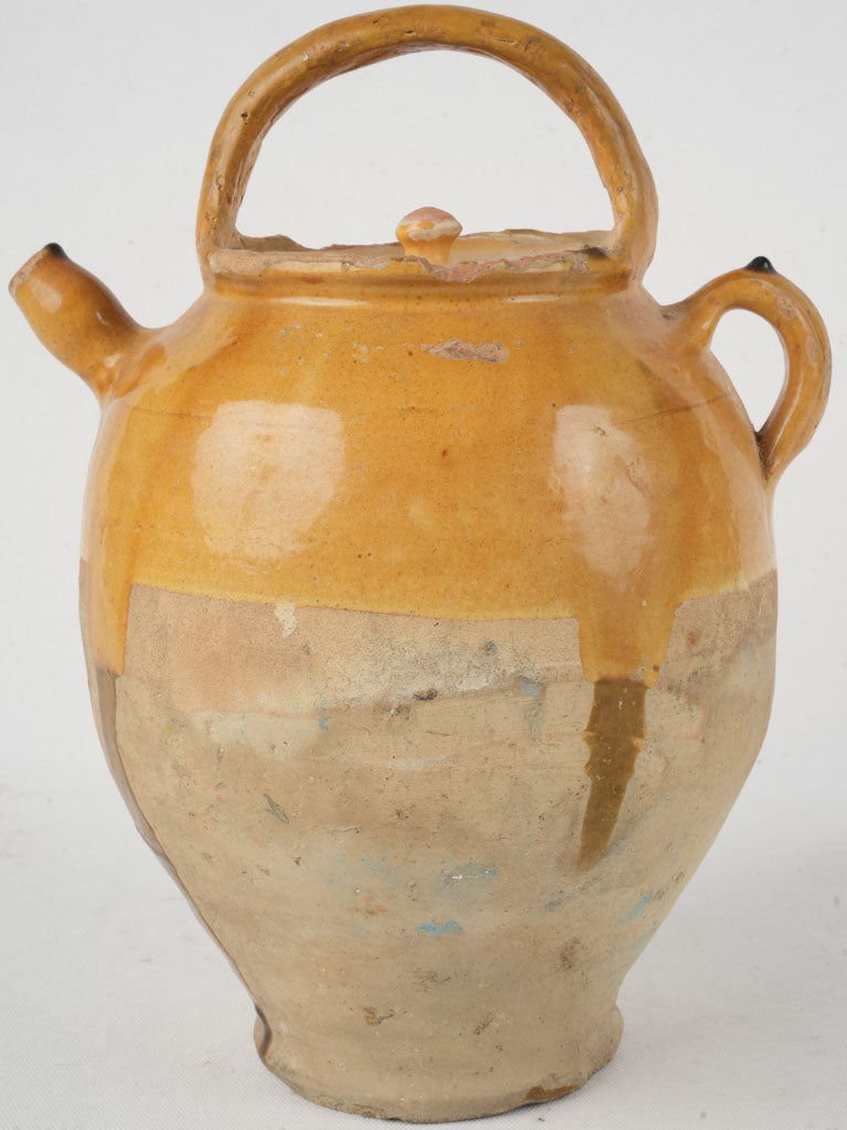 Traditional late-century ocher cruche
