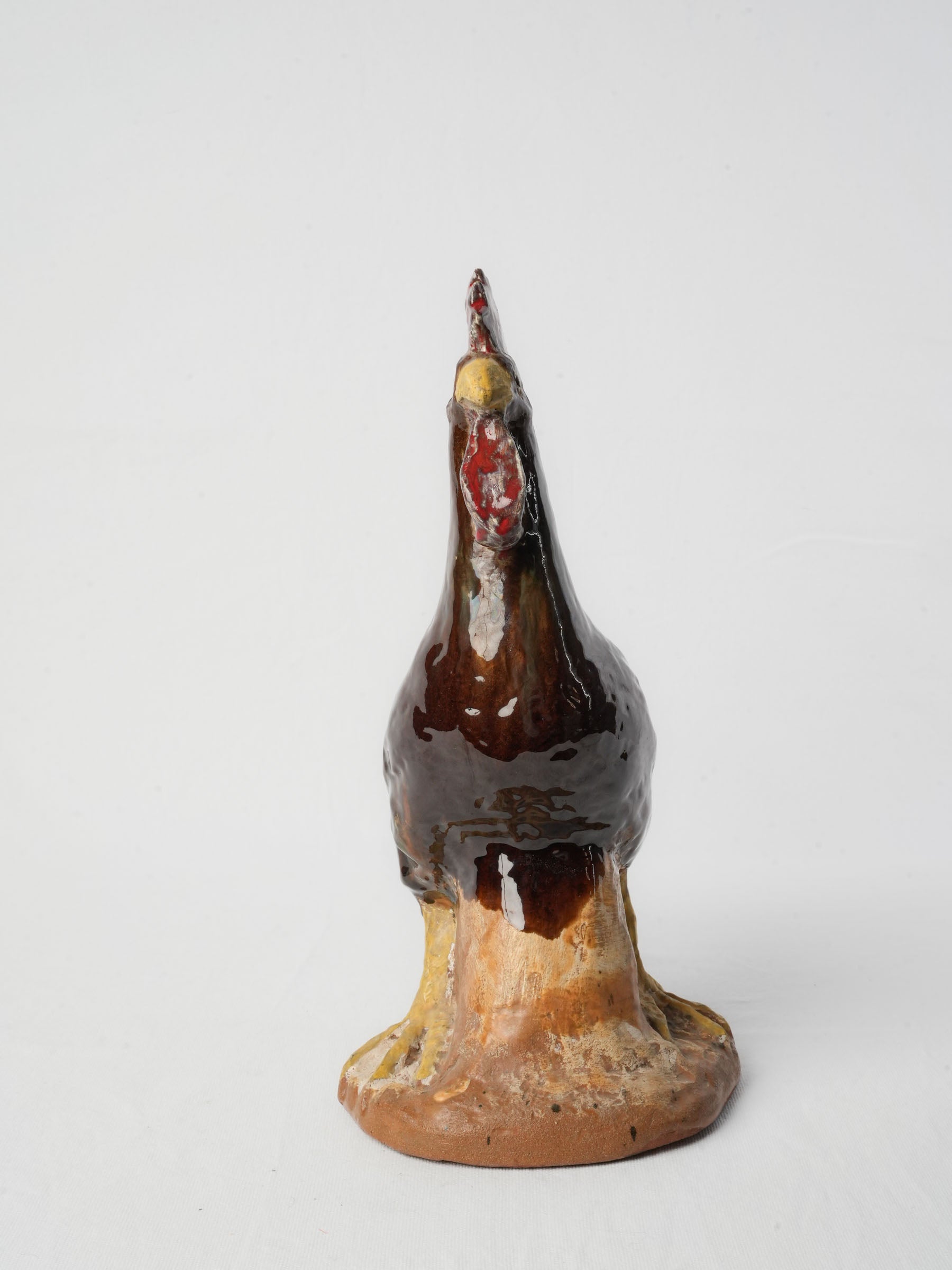 Vibrant glazed ceramic rooster figurine