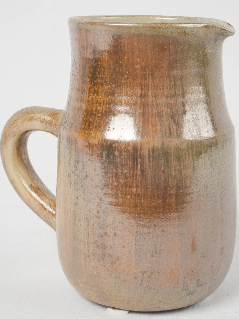 Iridescent glazed ceramic pitcher