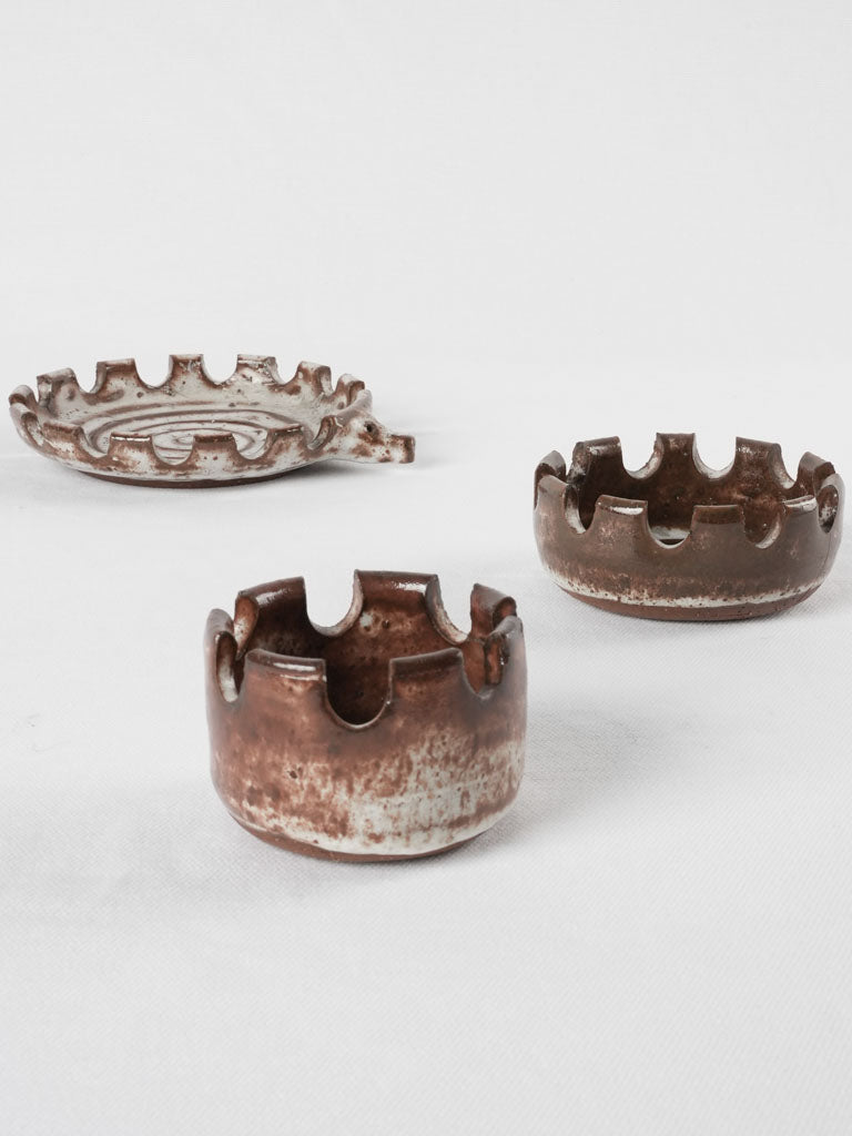 Three stacked vintage hedgehog  ceramic ashtrays