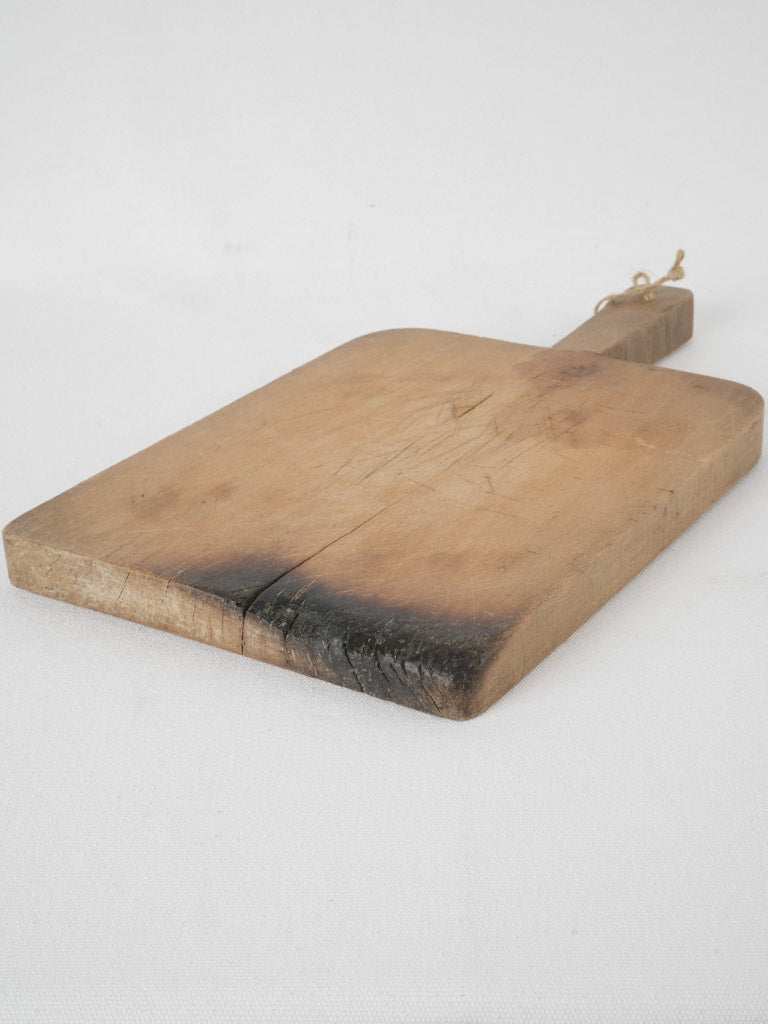 Handcrafted, aged, French kitchen tool
