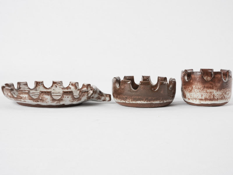 Three stacked vintage hedgehog  ceramic ashtrays