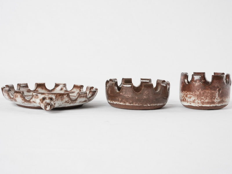 Three stacked vintage hedgehog  ceramic ashtrays