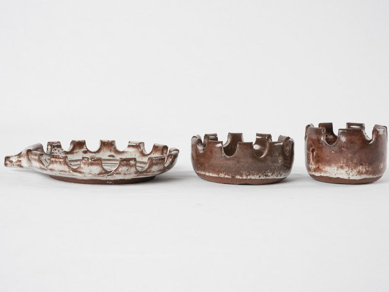 Three stacked vintage hedgehog  ceramic ashtrays