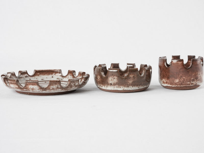 Three stacked vintage hedgehog  ceramic ashtrays