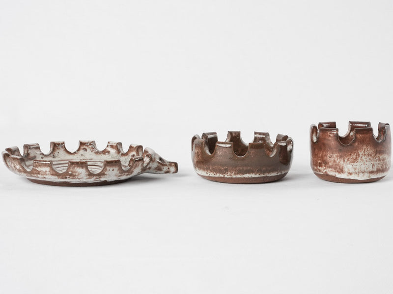 Three stacked vintage hedgehog  ceramic ashtrays