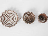 Three stacked vintage hedgehog  ceramic ashtrays