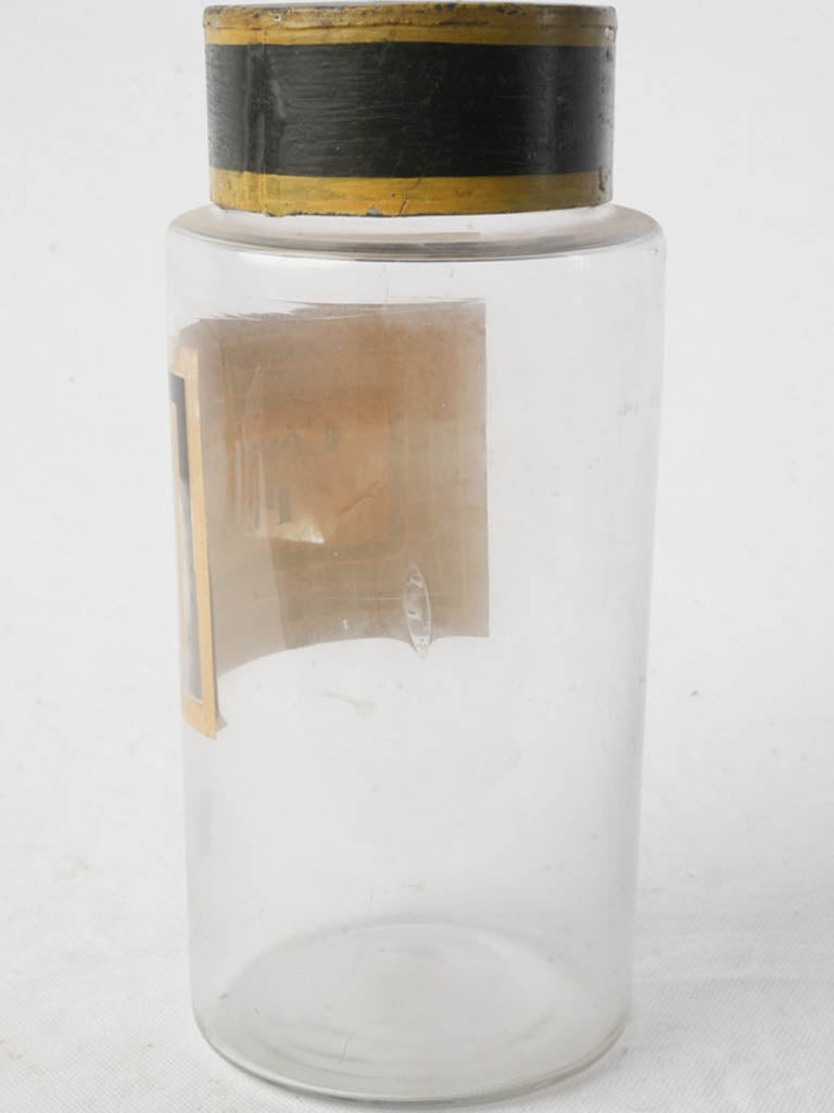 Gilt-framed labeled container