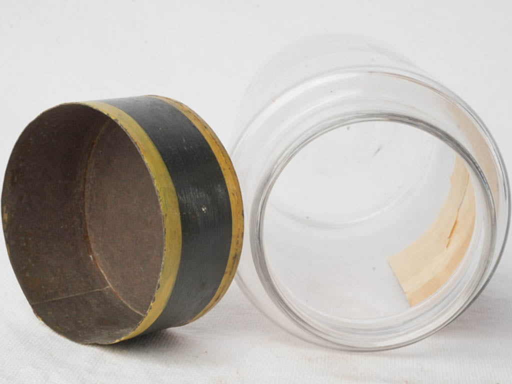 Clear glass tin-lidded jar