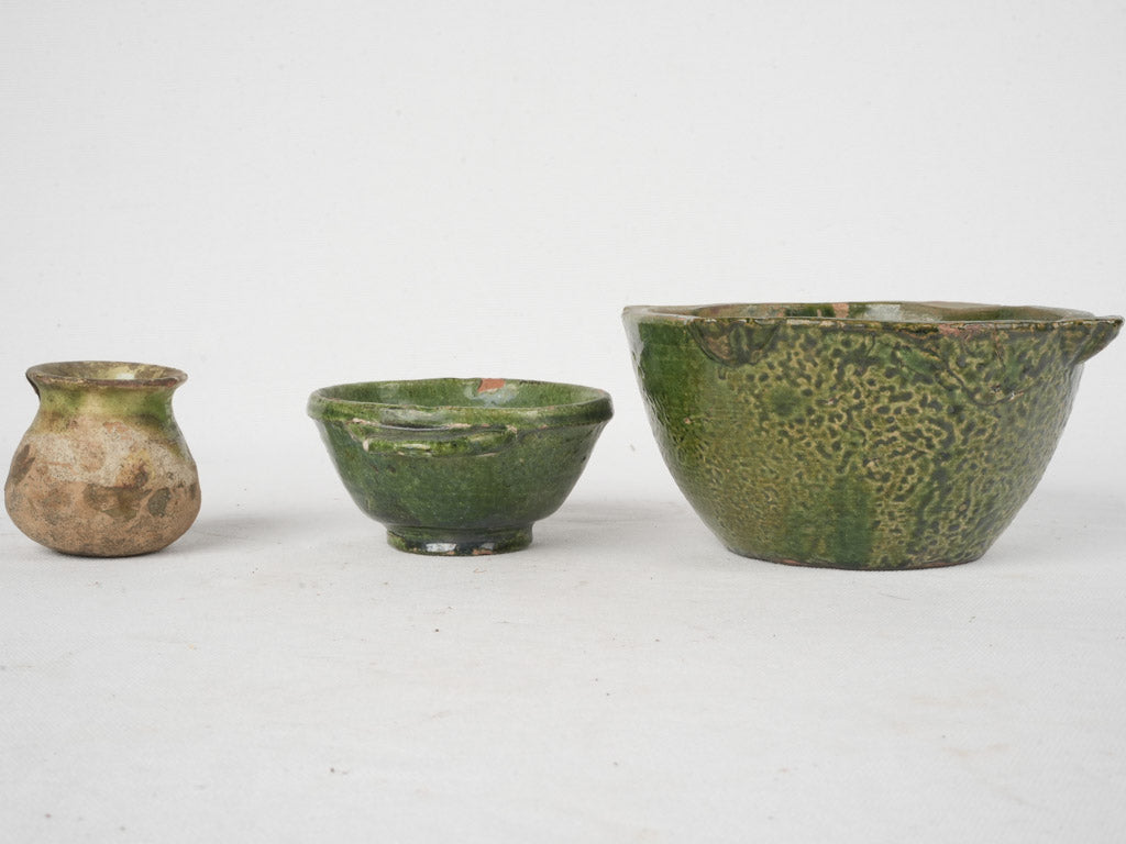 Aged French ceramic collectible trio