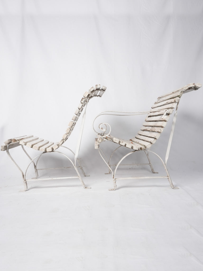 White wrought iron French chairs
