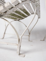 Time-worn timber slat chairs