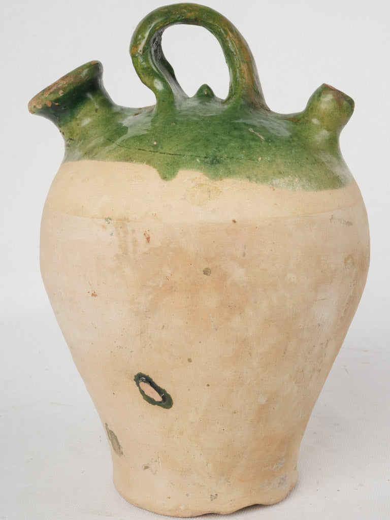 Traditional artistic green pitcher  
