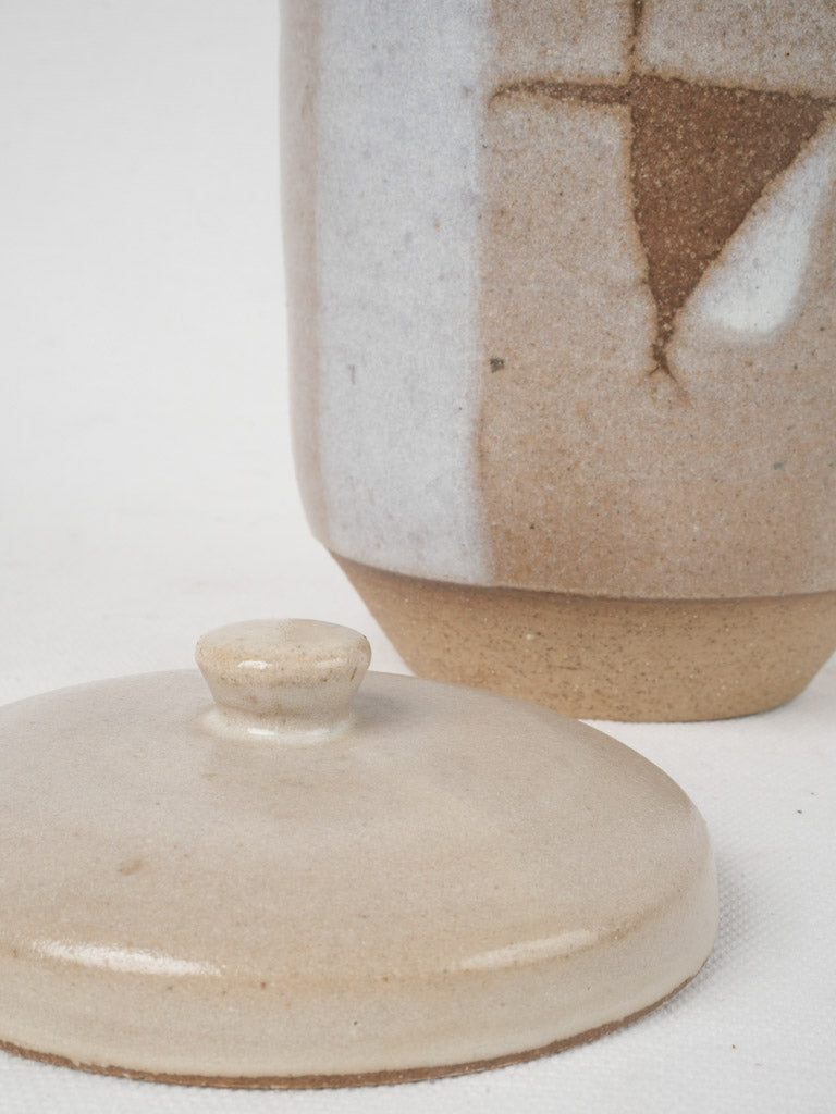Timeless French sandstone geometric lidded pot