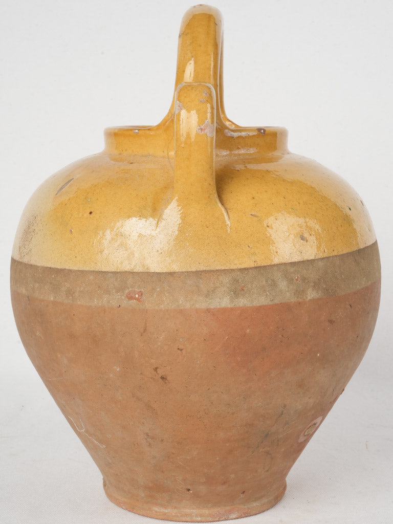 Antique ocher glaze pottery vessel