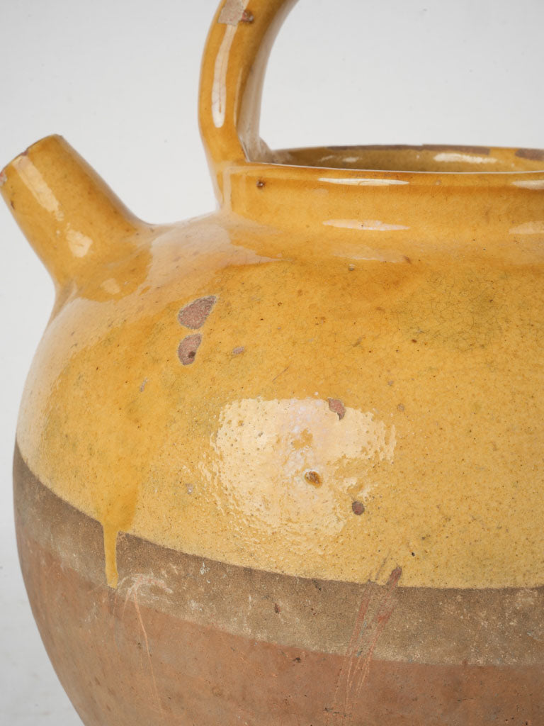 Gracefully curved handle pitcher
