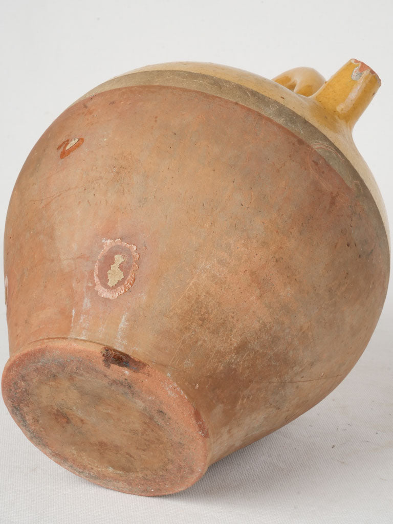 Semi-glazed ocher water jug