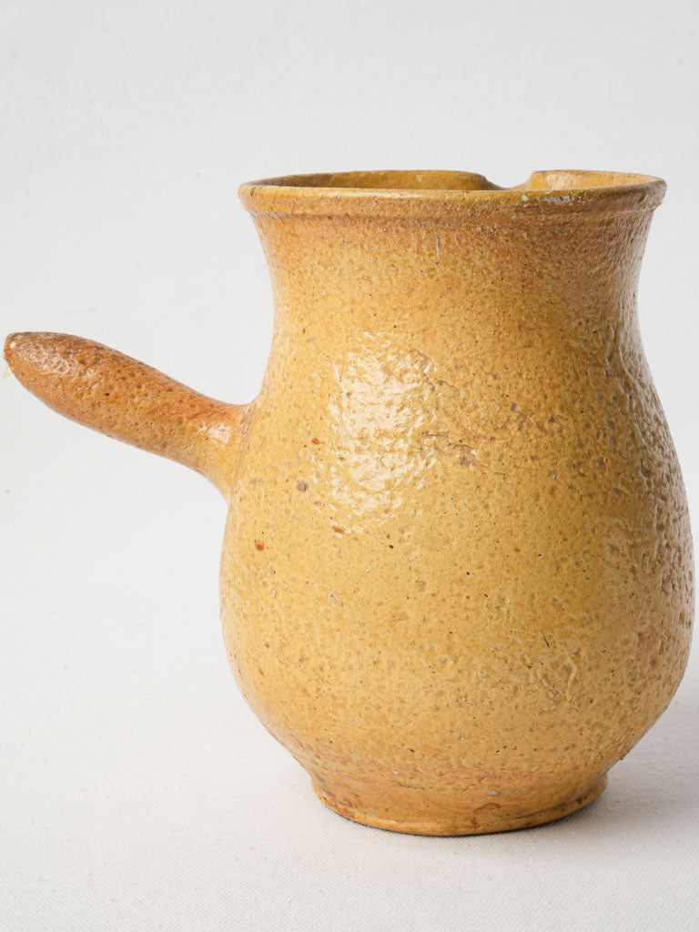 Retro textured citrus-hued carafe