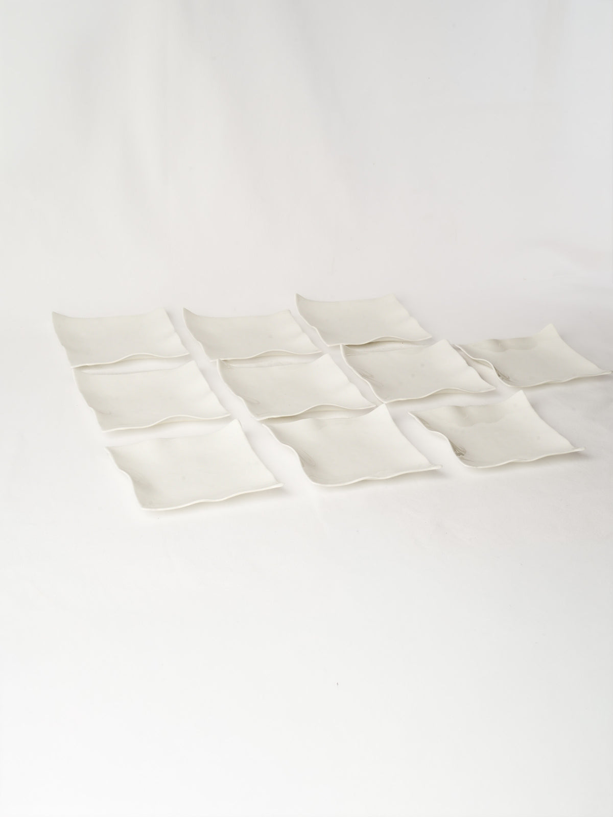 10 Handmade White Ceramic Square Plates w/ Undulating Edges 7"