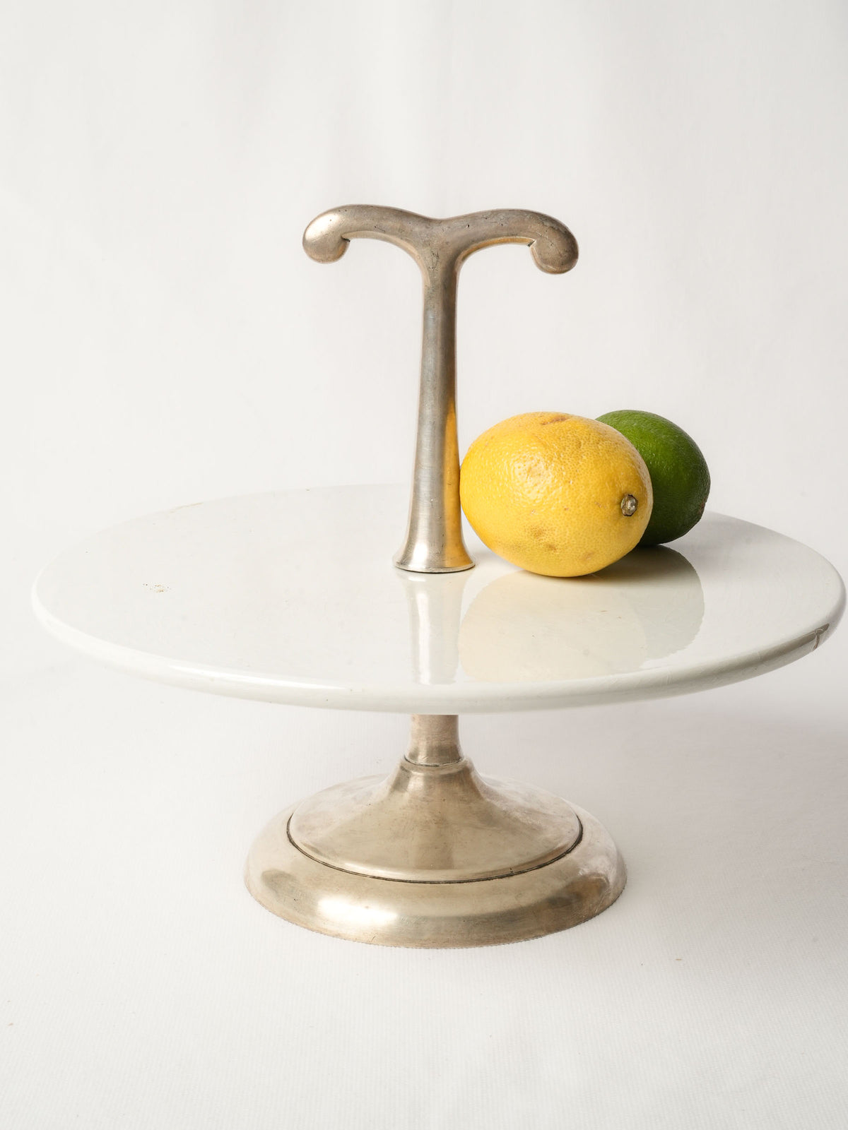 Revolving Ceramic Cake Stand with Silver Metal Pedestal