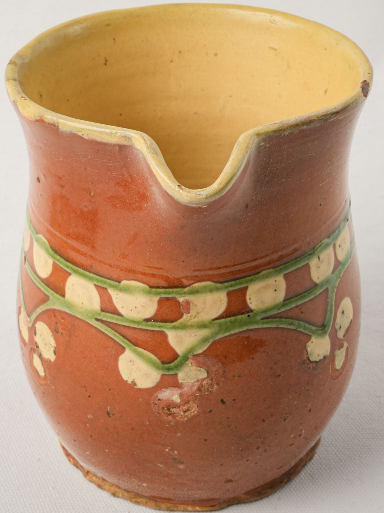 Yellow-spotted ceramic jug