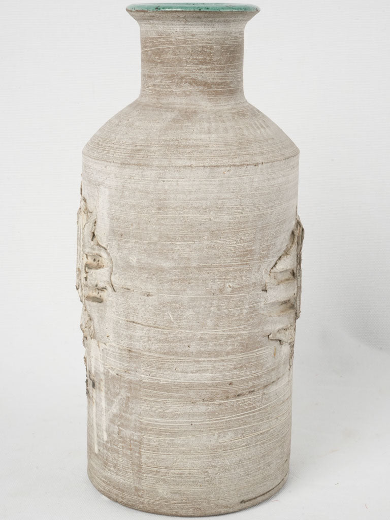 Textured antique off-white art vase