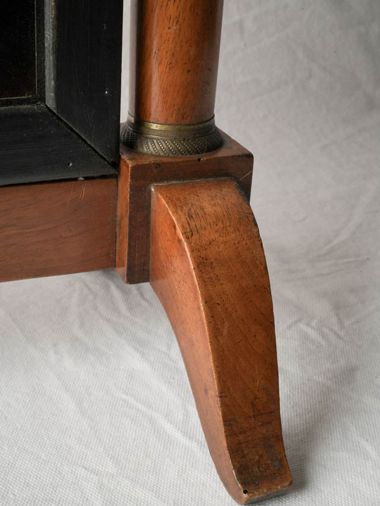 Sober black accented bedroom mirror  