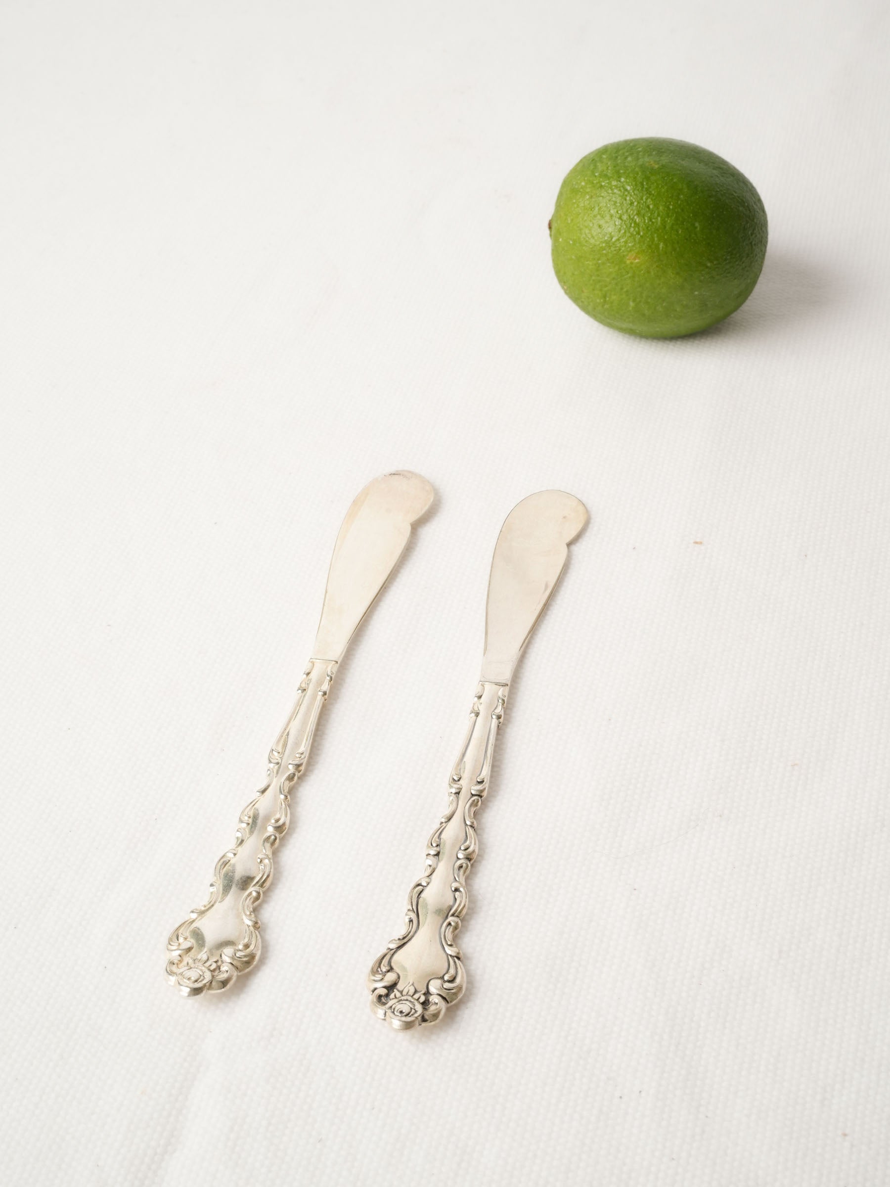 Pair of Vintage American Silverplate Butter Knives