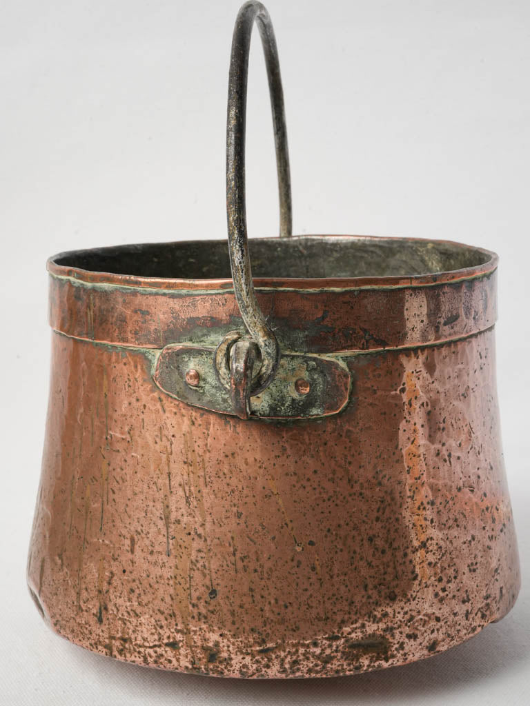 Antique iron-handled copper cauldron  