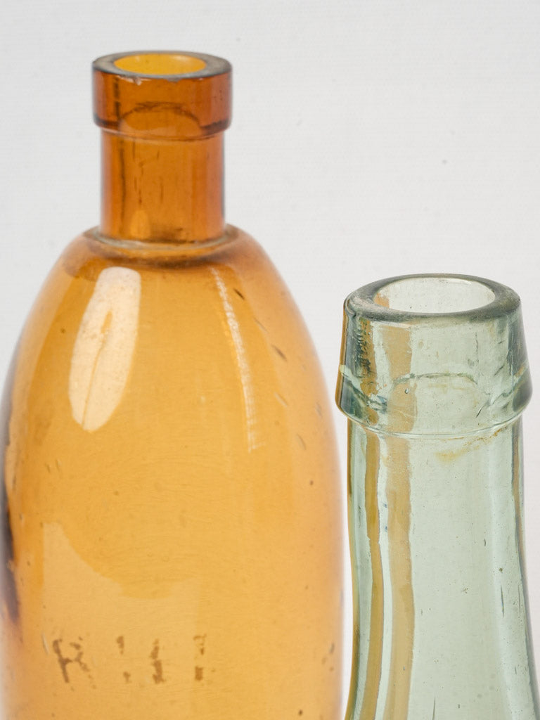 Blue, green, amber glass bottles
