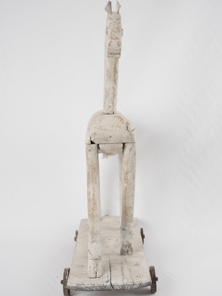 Antique French wooden horse on wheels 30¼"