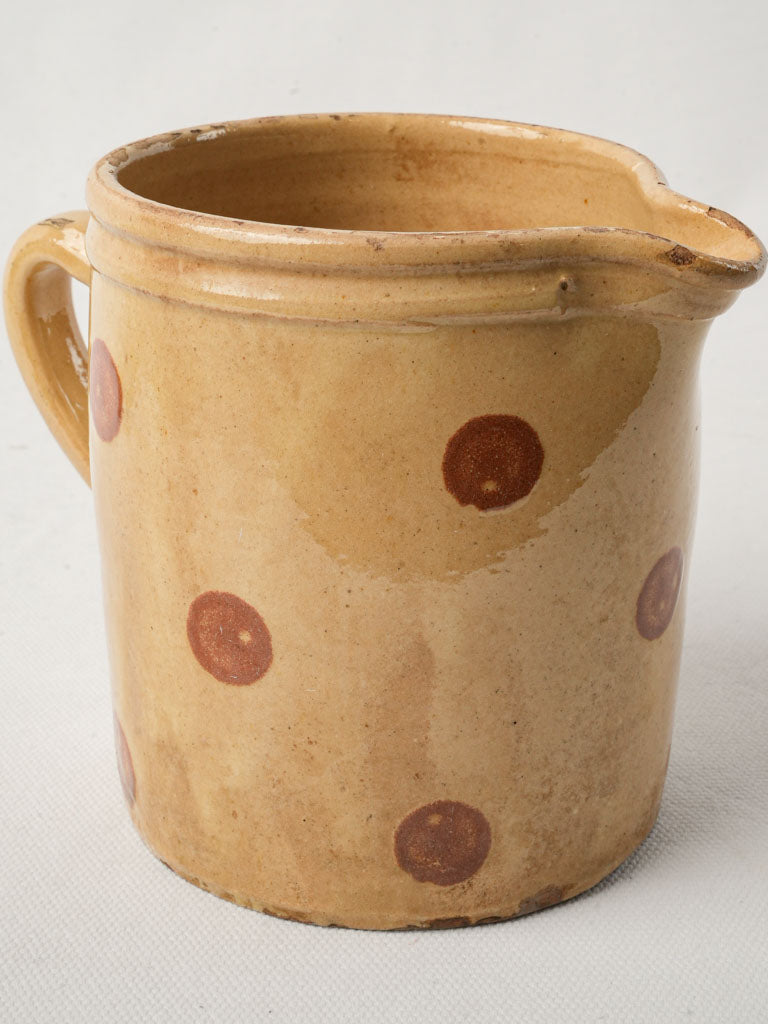 Rustic yellow ocher terracotta pitcher  