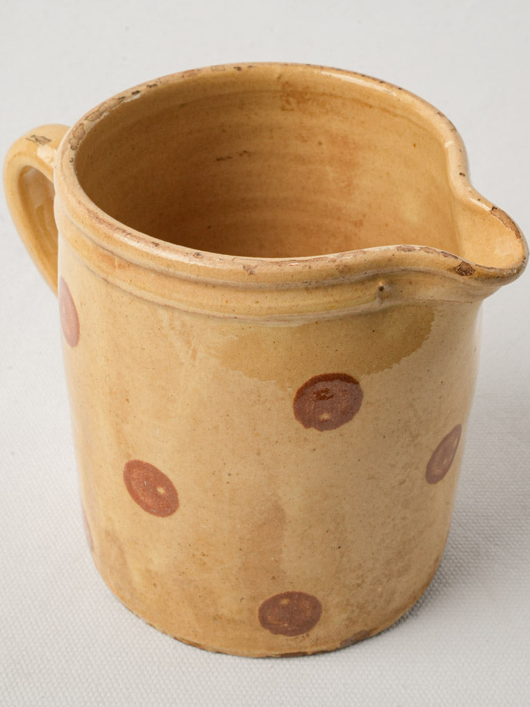 Playful brown-spotted ceramics pitcher  