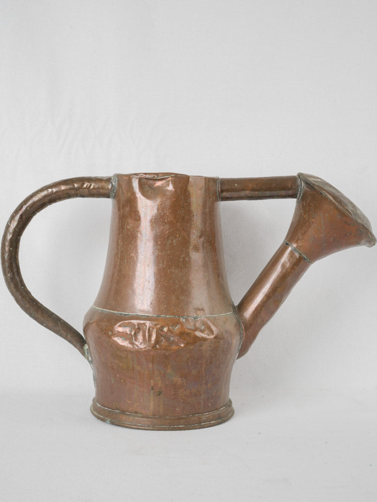 Charming, timeworn copper watering can
