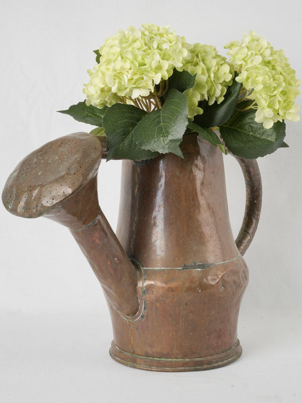 Timeless, aged French watering can